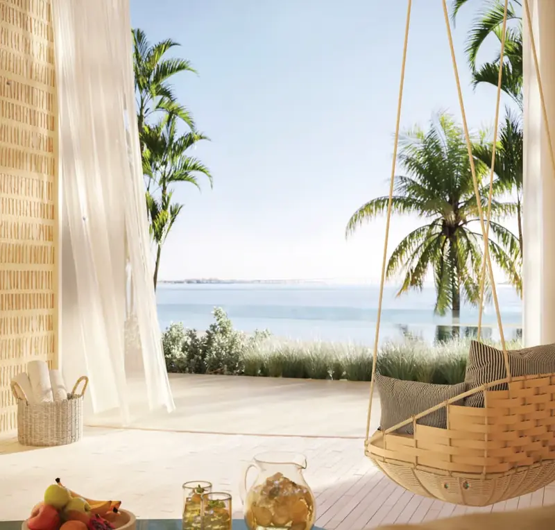 Terrace with hanging chair and bay views